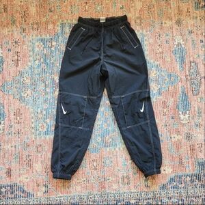 EUC Nike Sportswear Swoosh Repel Pants